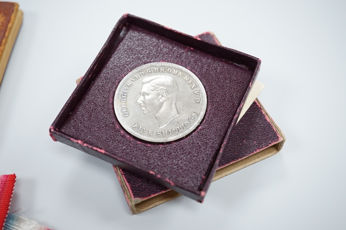 A quantity of assorted medals, an Essex crystal button, badges and ephemera